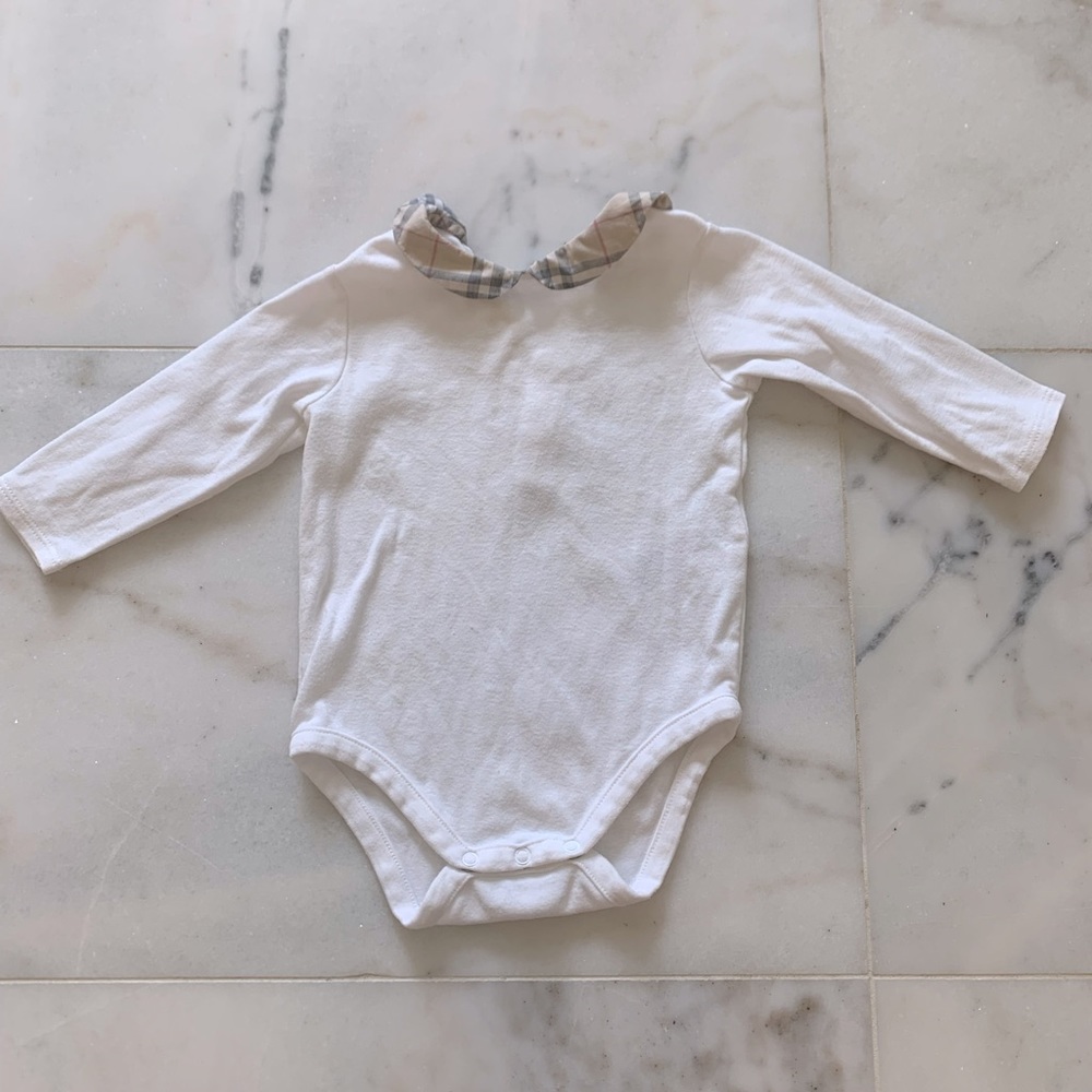 Burberry long sleeve onesie. Button closure.